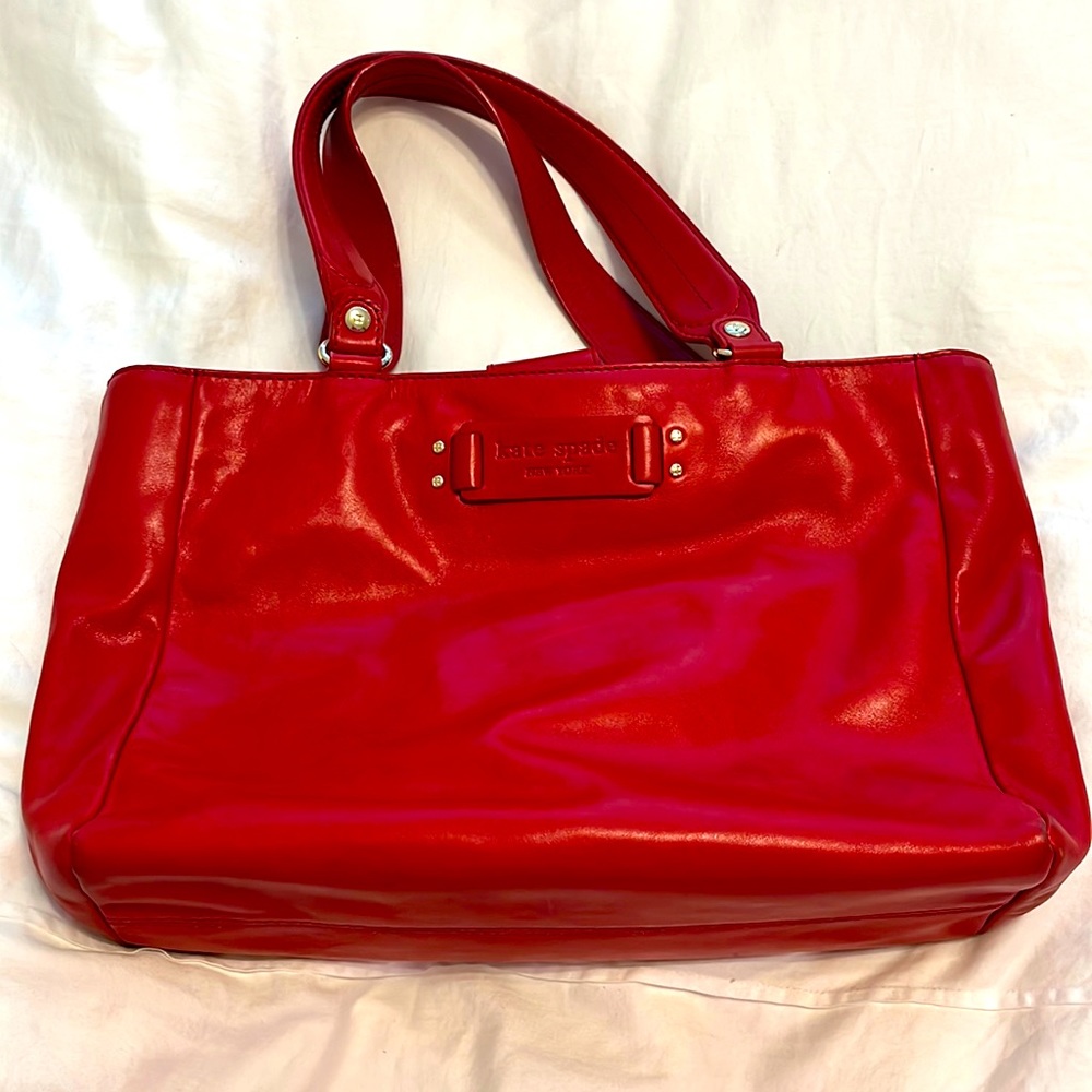 Kate spade red leather tote bag.